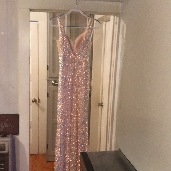 A gorgeous gown. With all over iridescent sequins. A must have for dances/balls - Picture 10 of 15